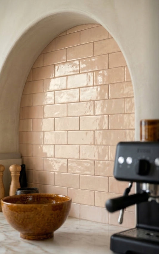 Apricot Glazed Thin Brick from Clay Imports with a glossy finish, installed in an arched kitchen alcove.