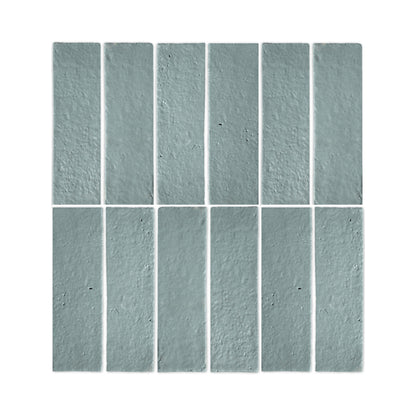 Rucksack Green Glazed Thin Brick 2.5x8 by Clay Imports, arranged in a grid pattern showing a rustic, textured surface.