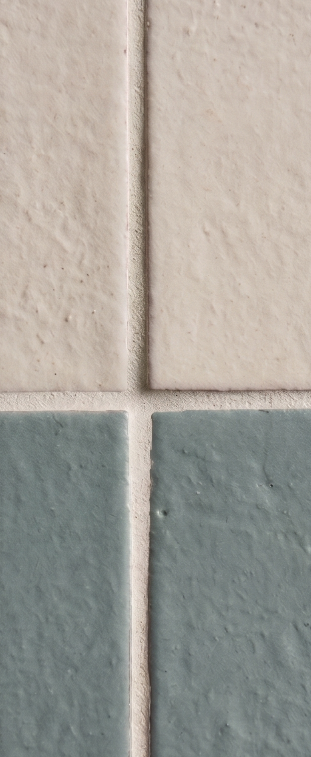 Glazed Thin Brick in Rucksack Green, 2.5x8, by Clay Imports, displaying a textured finish, with light grout and beige tiles.