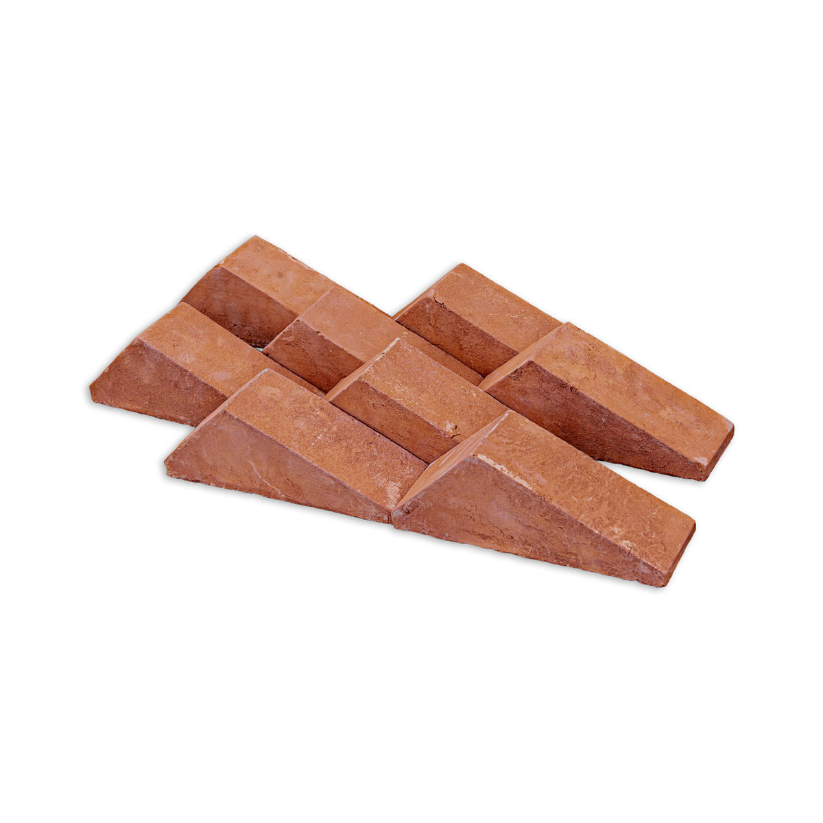 Four reddish-brown wedge-shaped paving stones arranged in two overlapping pairs on a plain white background.