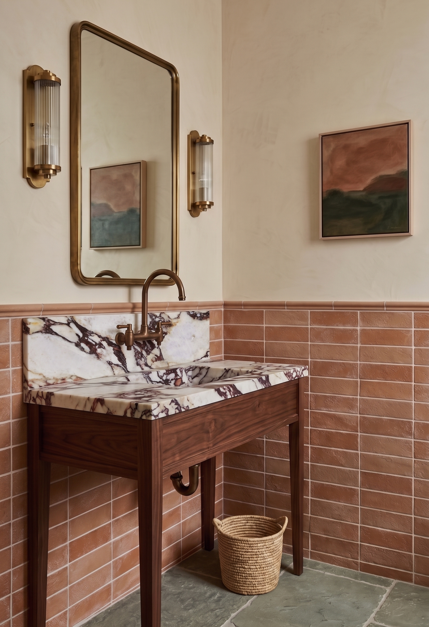 Matte terracotta 2.5x8 tiles from Clay Imports, installed in a horizontal brick pattern on a bathroom wall with a rounded trim.
