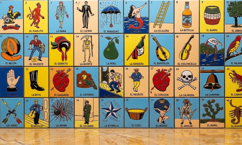 A colorful Mexican loteria game board displays traditional tiled cards featuring iconic illustrations like a rooster, a skeleton, and a heart.