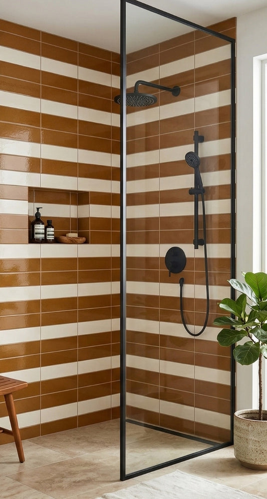 Brown and white striped solid tile by Clay Imports, laid horizontally on a shower wall with a glossy finish.
