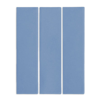 Denim blue 3x12 rectangular clay tiles by Clay Imports, arranged vertically with a subtle texture.