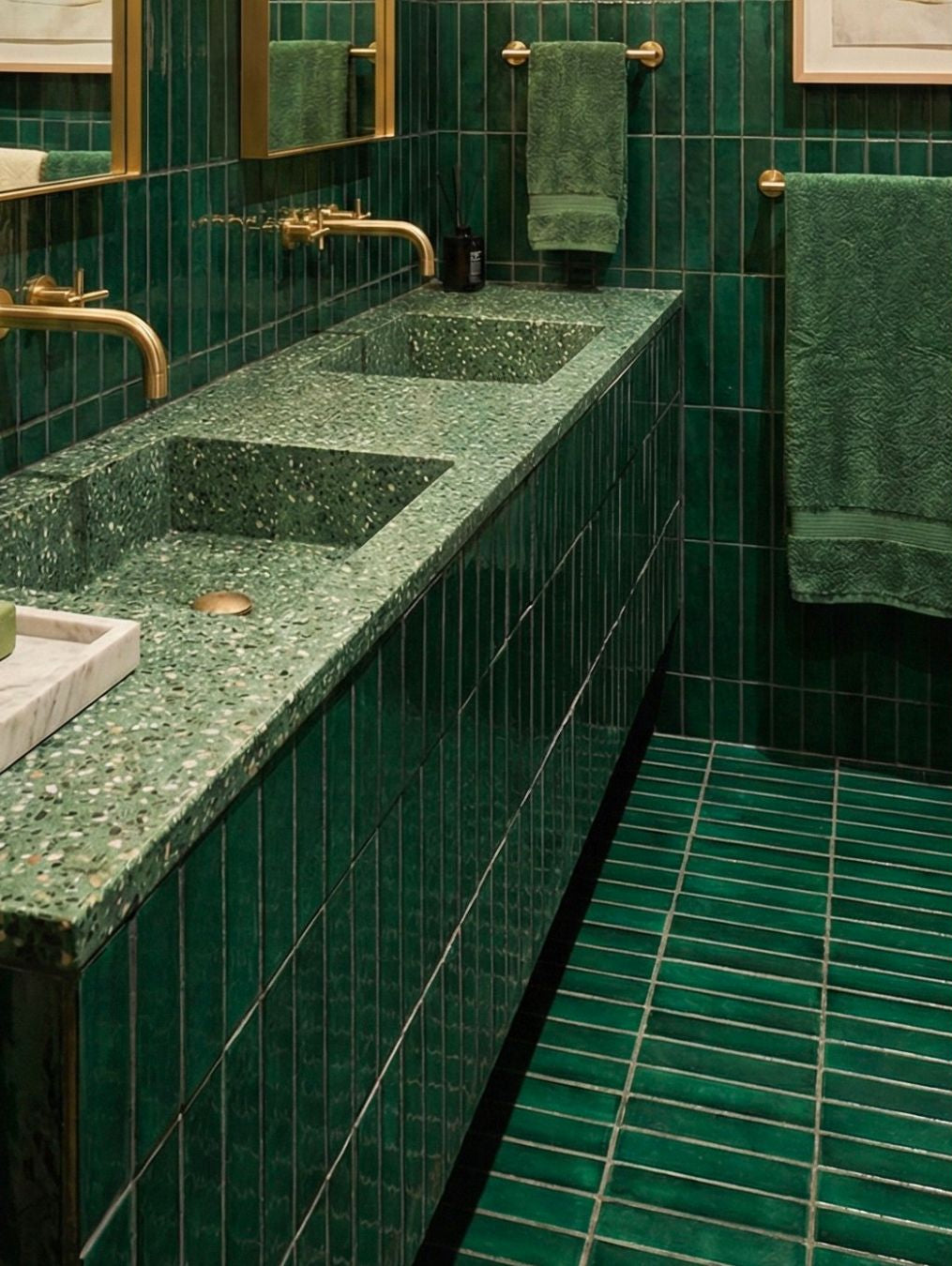 Emerald 3x12 Solid Tile from Clay Imports covering bathroom walls, vanity, and floor.
