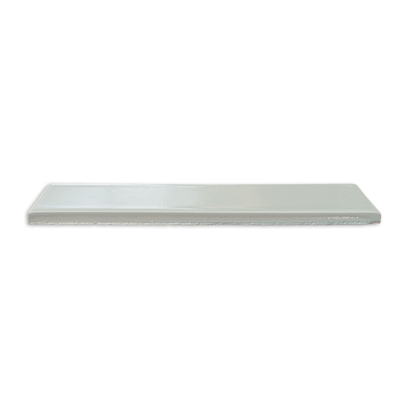 Light gray Espadin matte solid tile by Clay Imports, rectangular, shown at an angle.