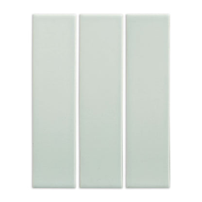 Light green matte 2x8 solid tile from Clay Imports, three rectangular pieces arranged vertically.