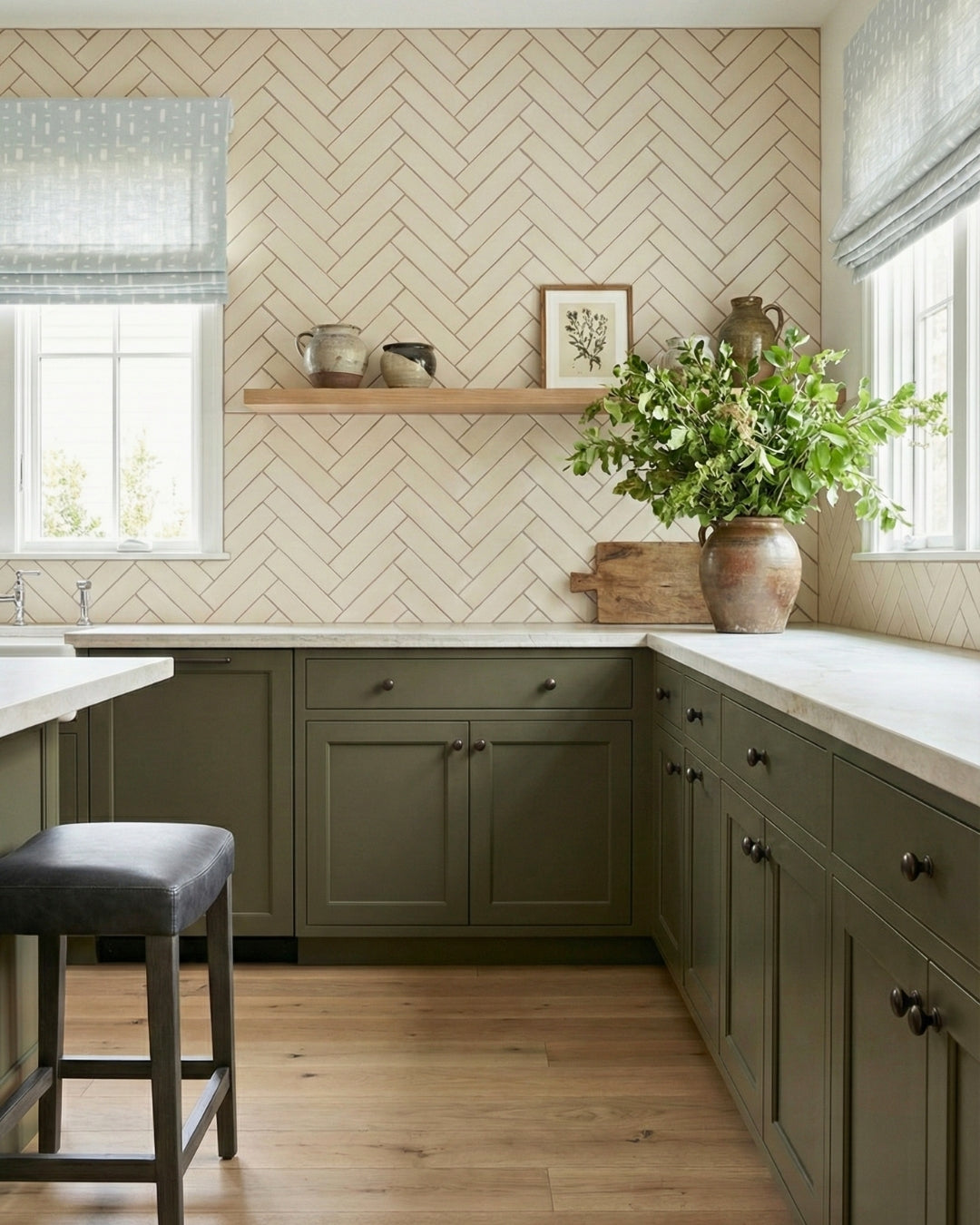 Mexican Vanilla 3x12 solid tile by Clay Imports in a warm cream herringbone pattern backsplash.