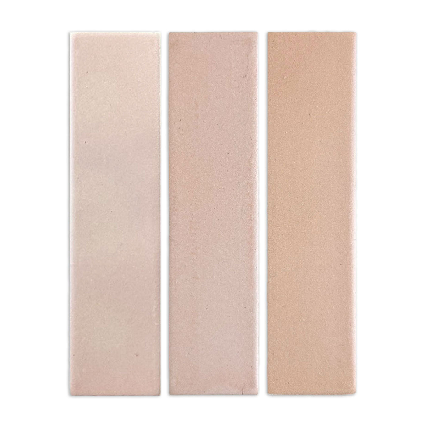 Three opaque 3x12 clay tiles by Clay Imports, showcasing a gradient of beige-brown neutral tones and subtle texture.