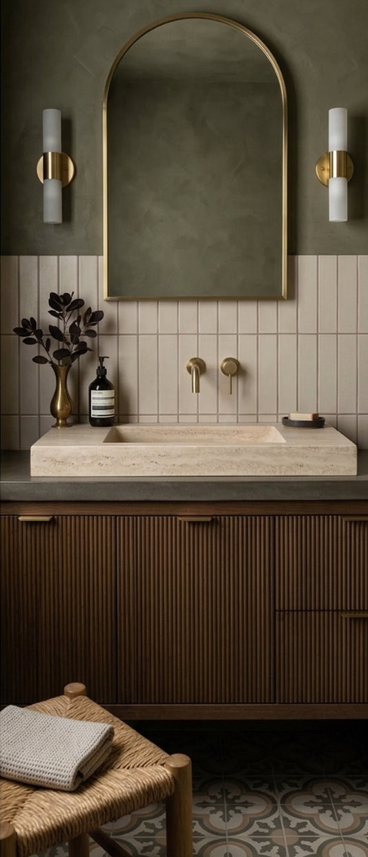 Pearl Snap 3x12 solid tiles by Clay Imports, vertically stacked in a light beige behind a bathroom vanity.