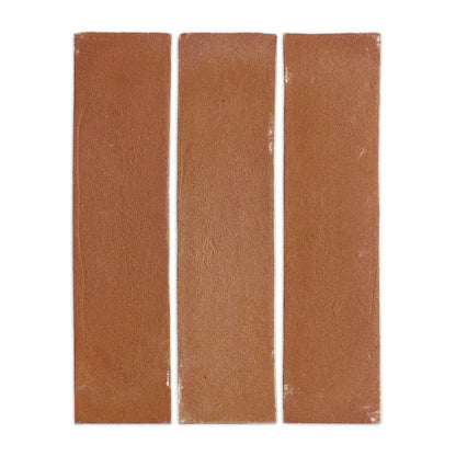 Umber 3x12 Cotto tiles by Clay Imports, arranged vertically with a matte, textured surface and slightly distressed edges.