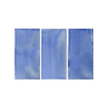 Three rectangular blue clay tiles by Clay Imports, arranged side-by-side on a white background.