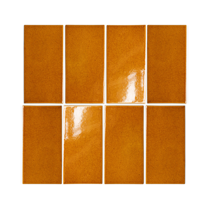 Terra cotta crackle clay tiles by Clay Imports, 3x6 rectangles in an 8-tile grid, featuring a glossy, cracked surface.