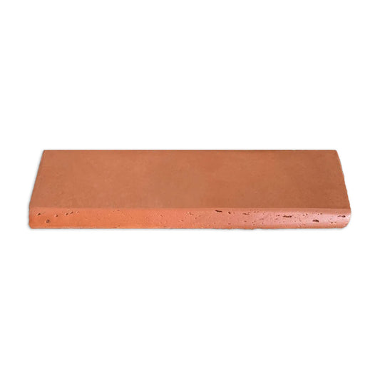 Red terracotta bullnose trim by Clay Imports with a smooth satin finish and textured side.