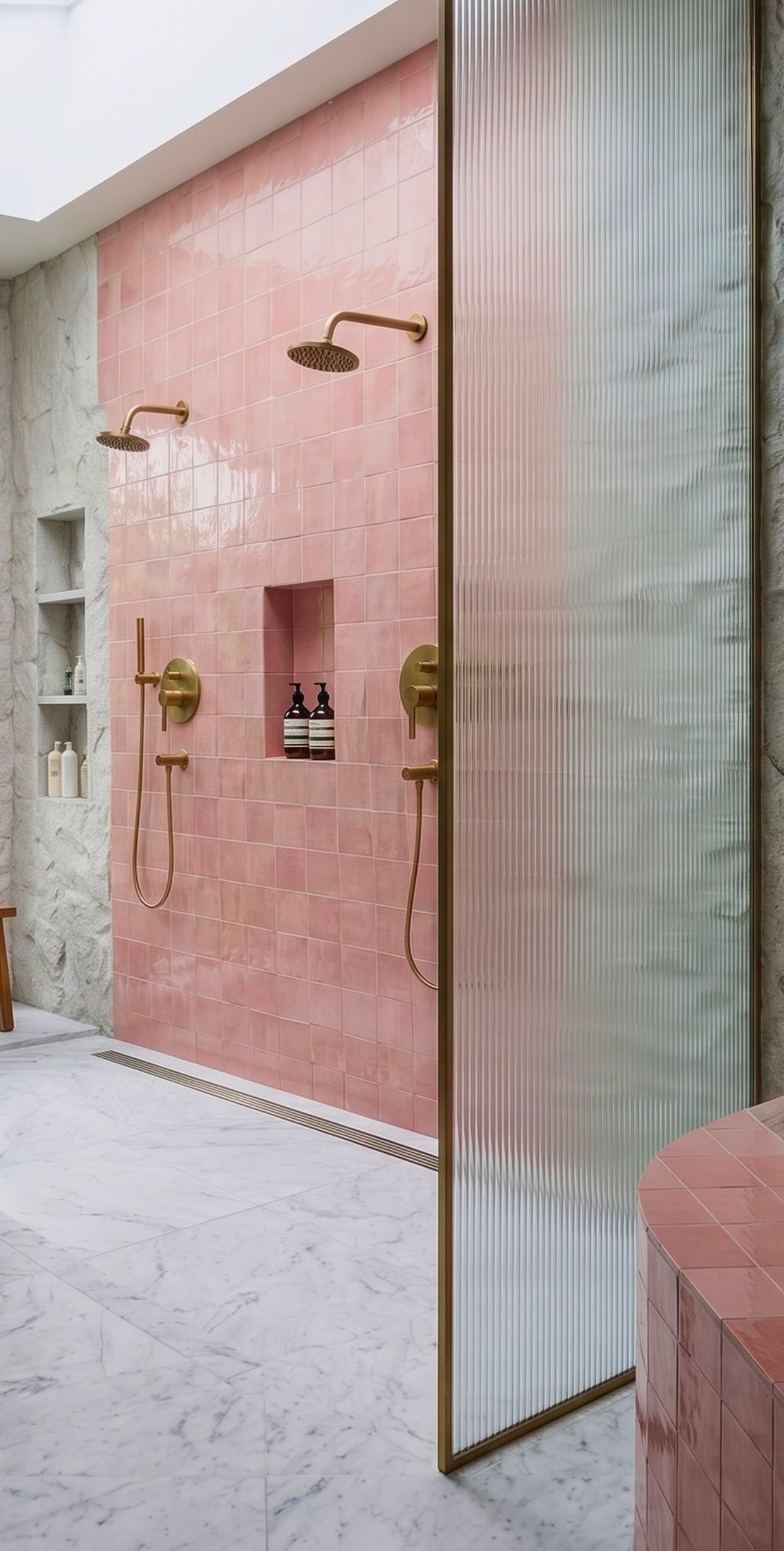 Pink square solid tiles by Clay Imports with a glossy finish and subtle color variation on a bathroom shower wall.