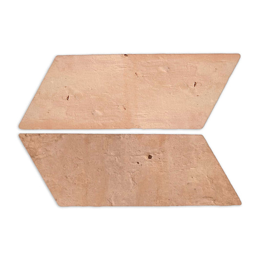 Antique matte terracotta parallelogram tile from Clay Imports, showing two rustic, muted reddish-brown tiles.