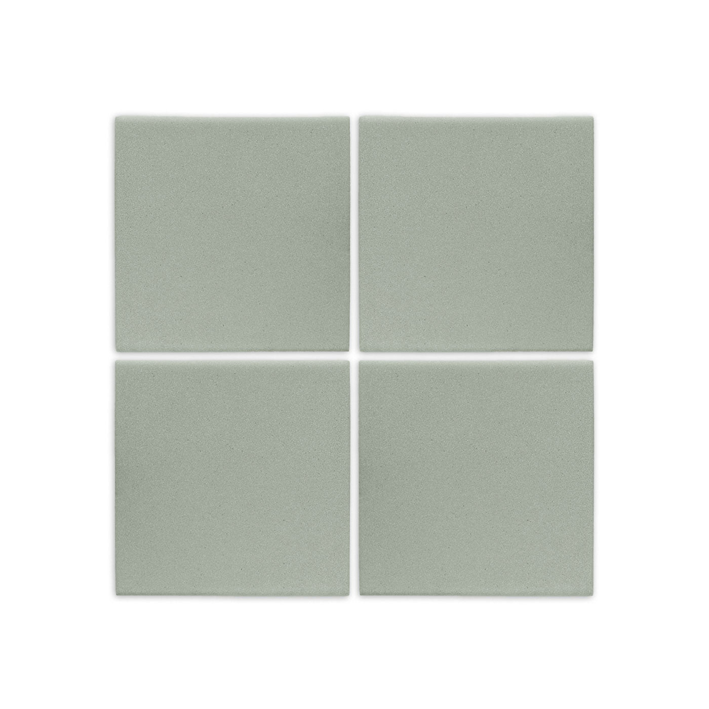 Four square agave green clay tiles by Clay Imports with a subtle textured, matte finish.