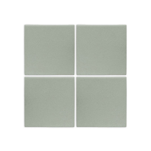 Four square agave green clay tiles by Clay Imports with a subtle textured, matte finish.