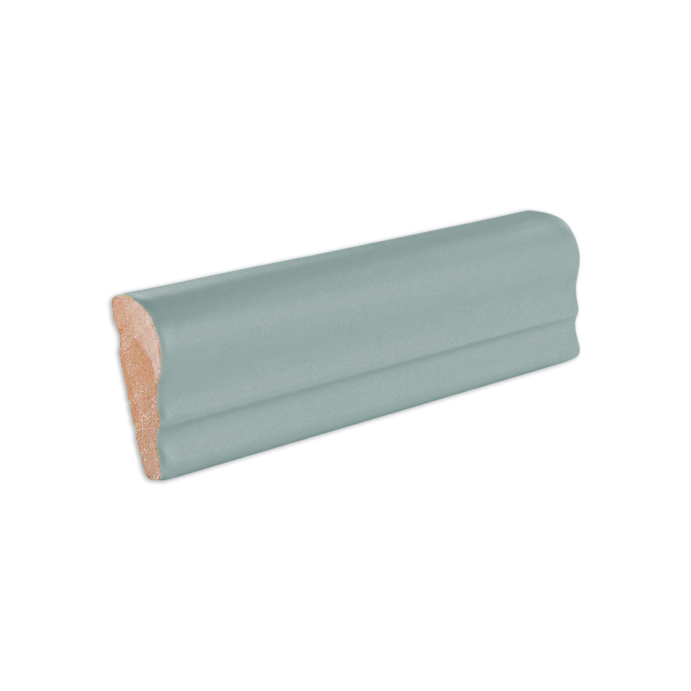 Greenish-grey chair rail solid tile trim by Clay Imports, with a reddish-brown exposed clay base.