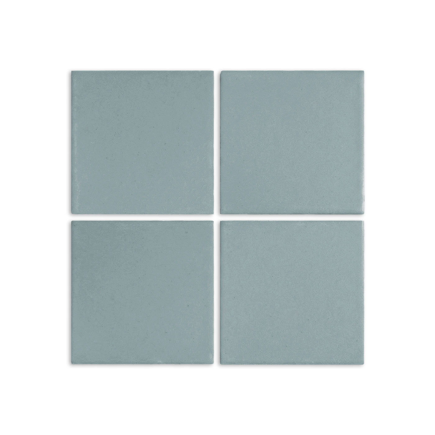 Pale teal square clay tiles by Clay Imports with a matte speckled texture, arranged in a 2x2 grid.