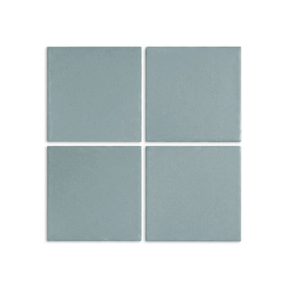 Pale teal square clay tiles by Clay Imports with a matte speckled texture, arranged in a 2x2 grid.