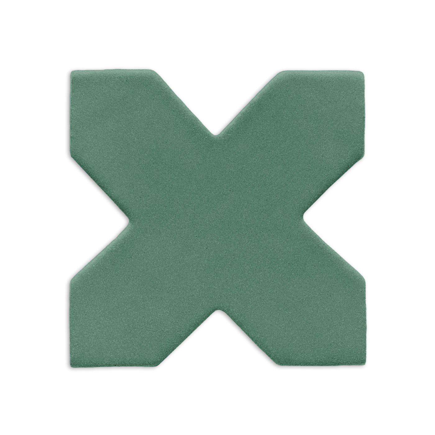 An X-shaped clay tile in muted green by Clay Imports, featuring a subtle grainy texture and soft, rounded edges.