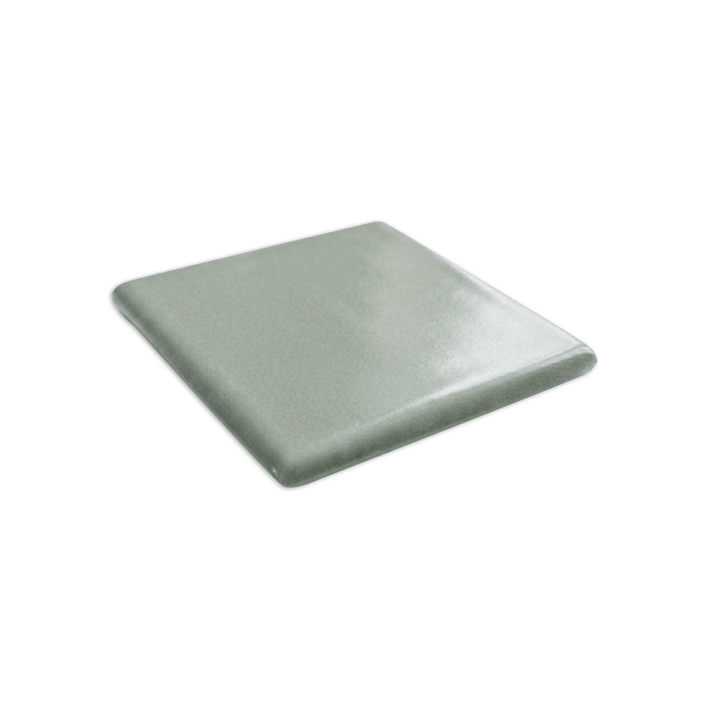 Double bullnose agave-colored tile by Clay Imports, a square piece with rounded edges and a subtle texture.
