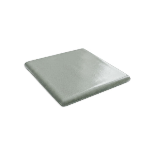 Double bullnose agave-colored tile by Clay Imports, a square piece with rounded edges and a subtle texture.