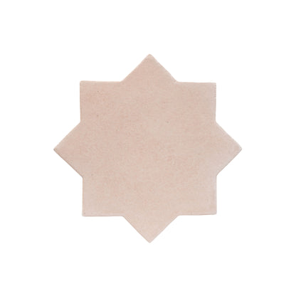 A light beige, 8-pointed star clay tile by Clay Imports with an opaque, slightly textured finish, isolated.
