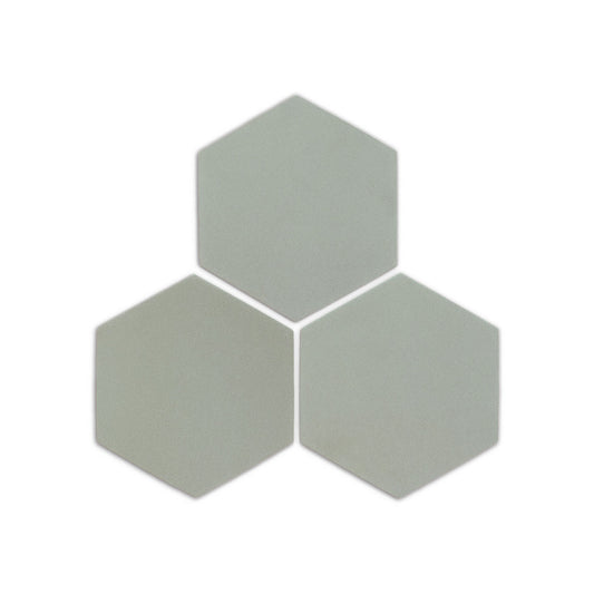 Three light green hexagon clay tiles by Clay Imports, arranged in a cluster with a matte finish.