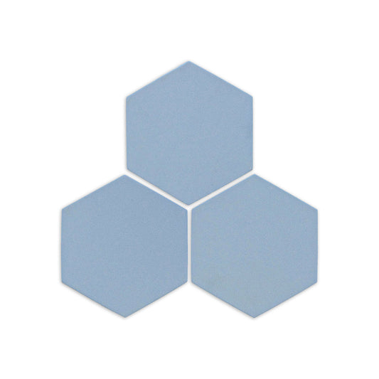 Blue Agate Hexagon Clay tile by Clay Imports, showing three light blue tiles with a matte, textured finish.