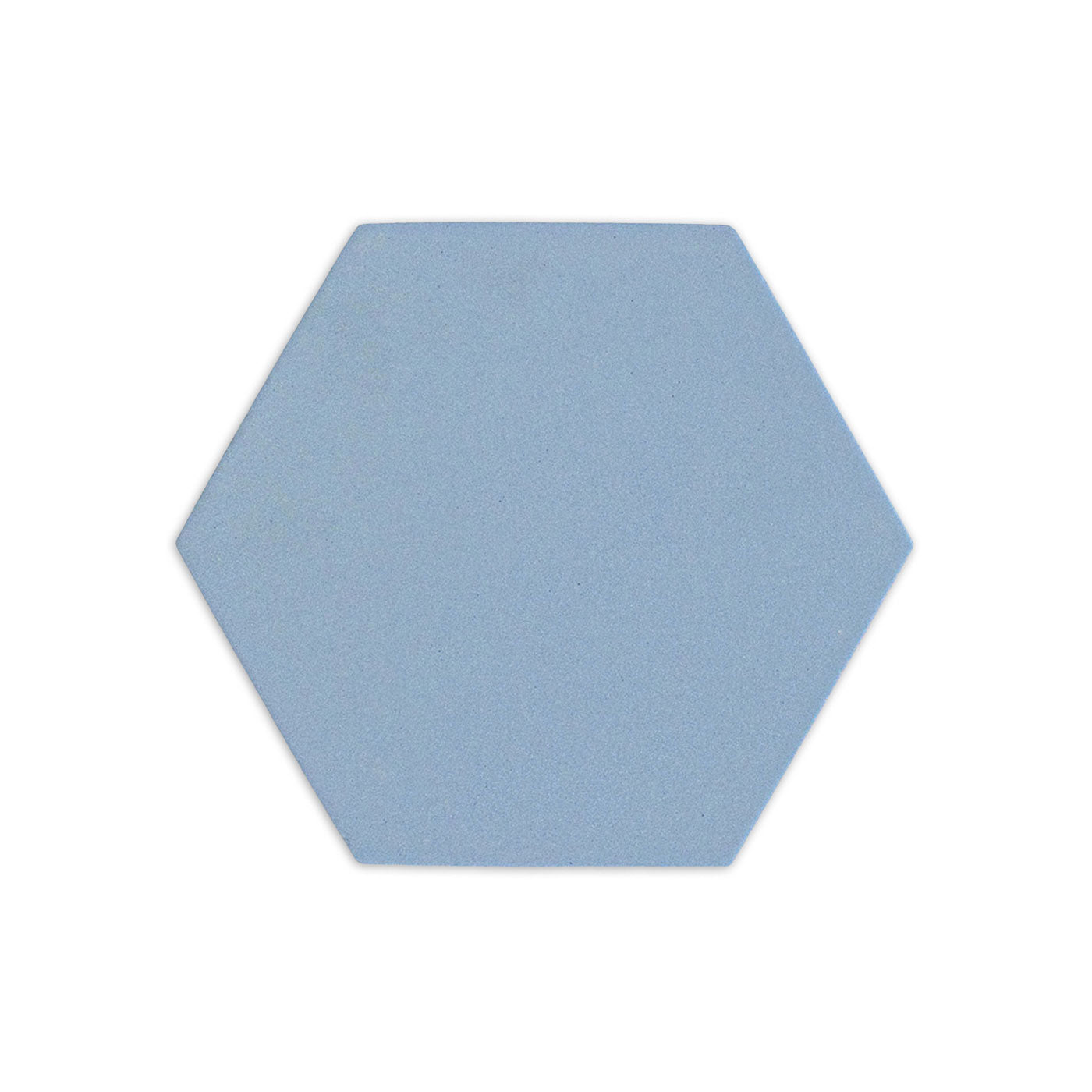 Blue hexagonal clay tile by Clay Imports with a fine-grained, matte texture, casting a soft shadow.