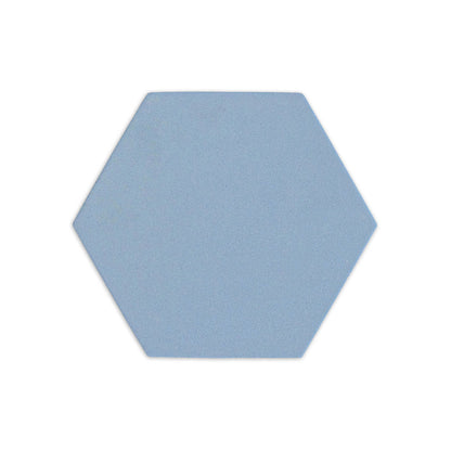 Blue hexagonal clay tile by Clay Imports with a fine-grained, matte texture, casting a soft shadow.