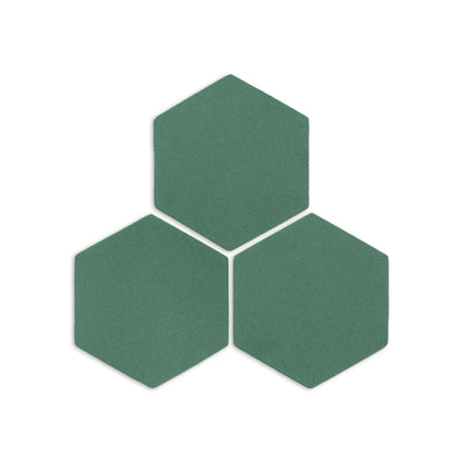 Cilantro green hexagon clay tiles by Clay Imports arranged in a cluster of three on a white background with a matte, textured surface.