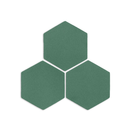 Cilantro green hexagon clay tiles by Clay Imports arranged in a cluster of three on a white background with a matte, textured surface.