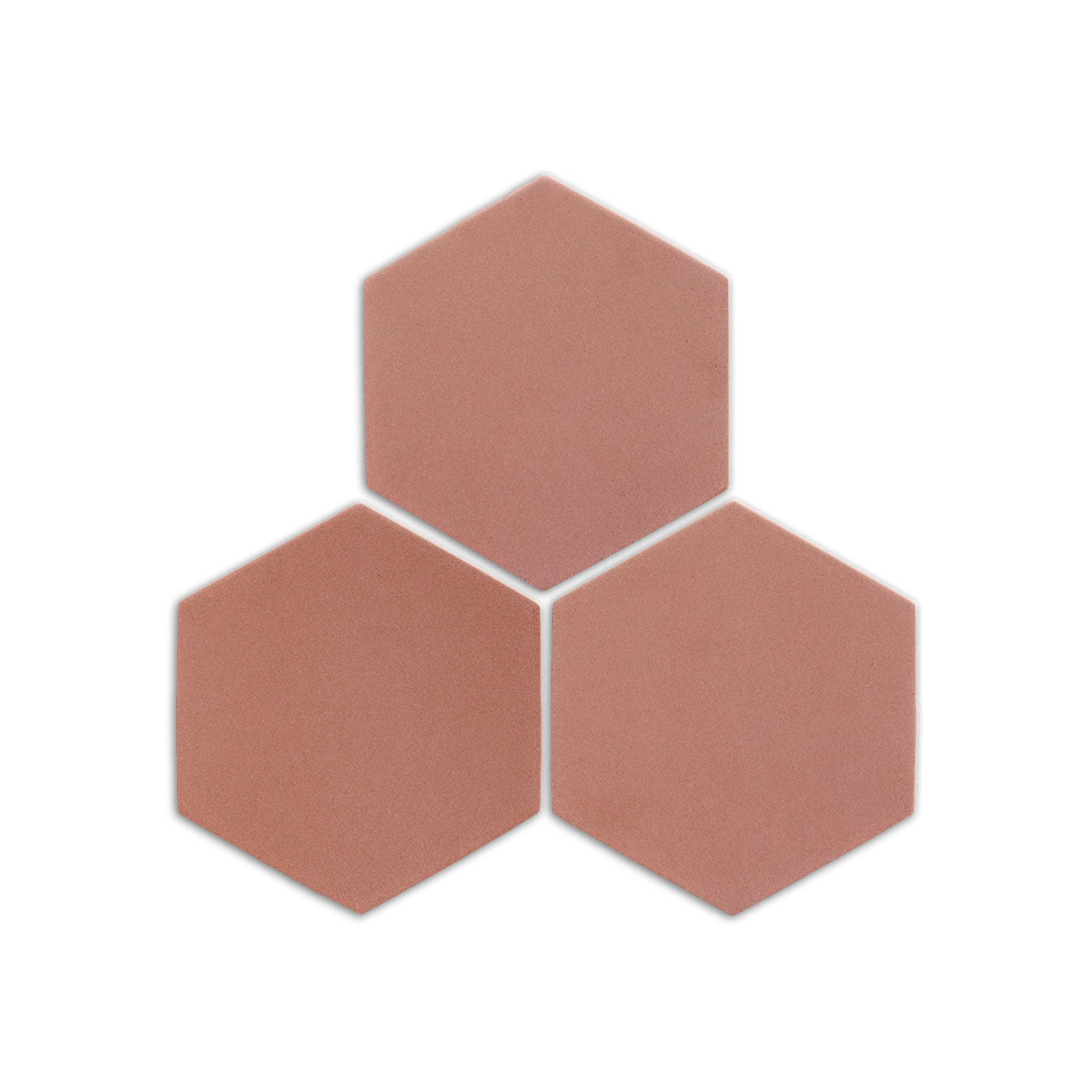 Hexagon pink granite clay tiles by Clay Imports, arranged in a cluster with a subtle texture.