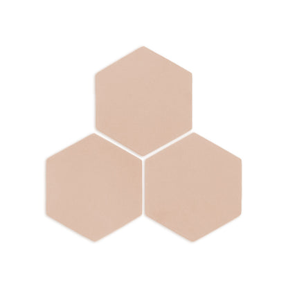 Three textured hexagon sand-colored clay tiles by Clay Imports, arranged in a triangular pattern.