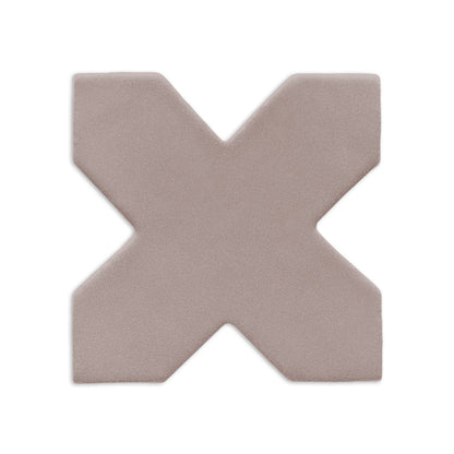 Light brown cross-shaped clay tile by Clay Imports with a subtle textured finish and soft, rounded edges.