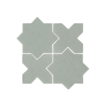 Agave 4 solid tile by Clay Imports in sage green, featuring an X and an 8-pointed star design.