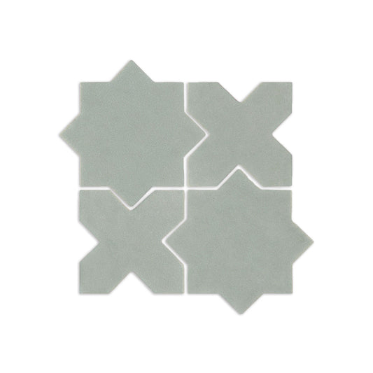 Agave 4 solid tile by Clay Imports in sage green, featuring an X and an 8-pointed star design.