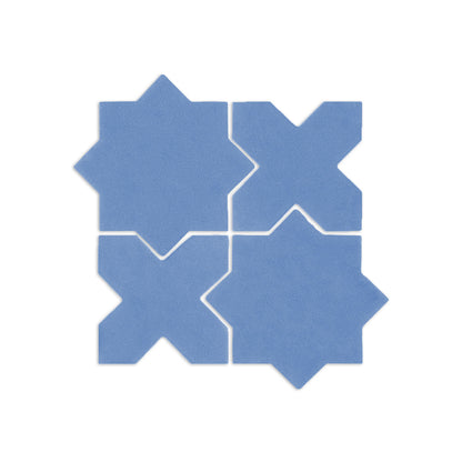 Denim blue Mini Star & Cross clay tiles by Clay Imports, arranged in an interlocking pattern on a white background.