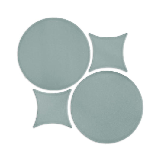 Muted green Rombo & Circle shape clay tile by Clay Imports, with an interlocking geometric pattern of circles and curved squares.
