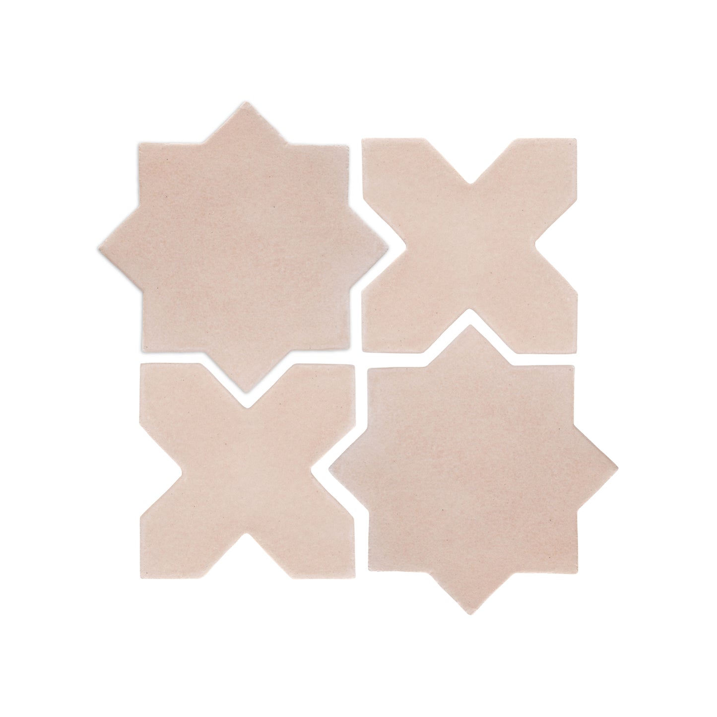 Four light beige ceramic star and cross tiles by Clay Imports, arranged in a grid with visible white grout lines.
