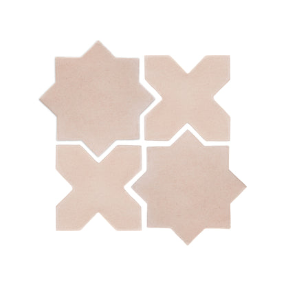 Four light beige ceramic star and cross tiles by Clay Imports, arranged in a grid with visible white grout lines.