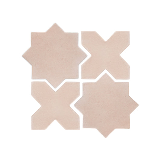 Four light beige ceramic star and cross tiles by Clay Imports, arranged in a grid with visible white grout lines.