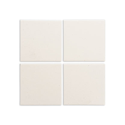 Mexican Vanilla 4.25x4.25 Solid Tile by Clay Imports, showing four cream-colored tiles with a subtle, speckled texture arranged in a grid.