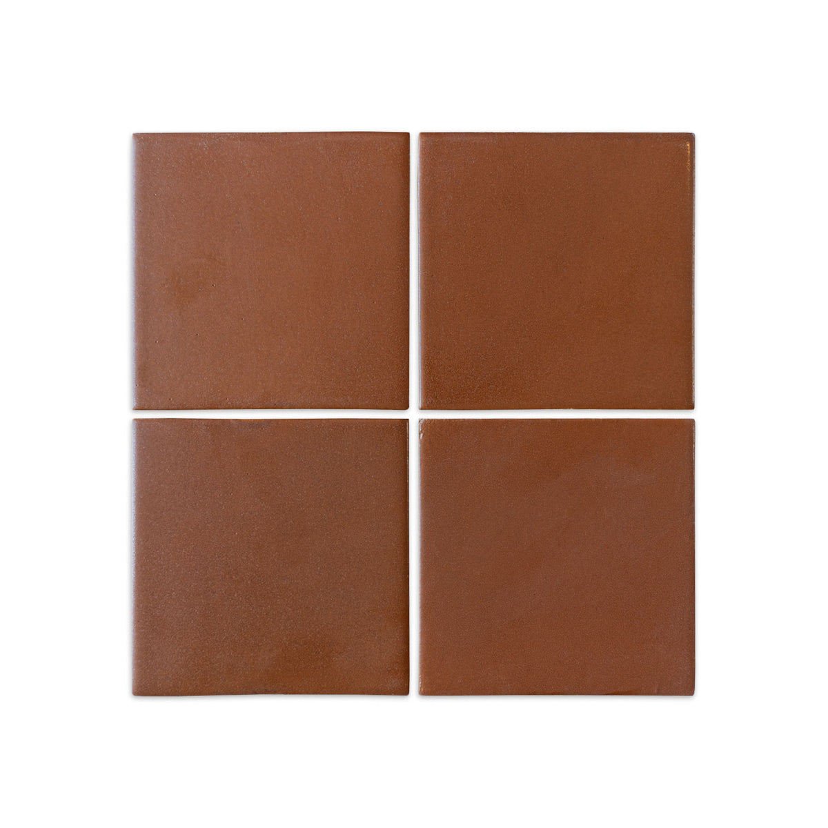 Four cacao brown square solid tiles by Clay Imports, arranged in a grid with thin white grout.