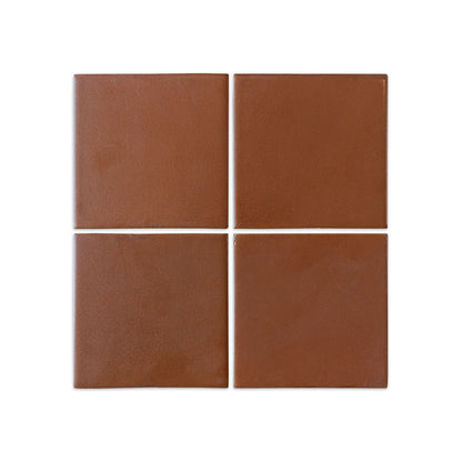 Four cacao brown square solid tiles by Clay Imports, arranged in a grid with thin white grout.