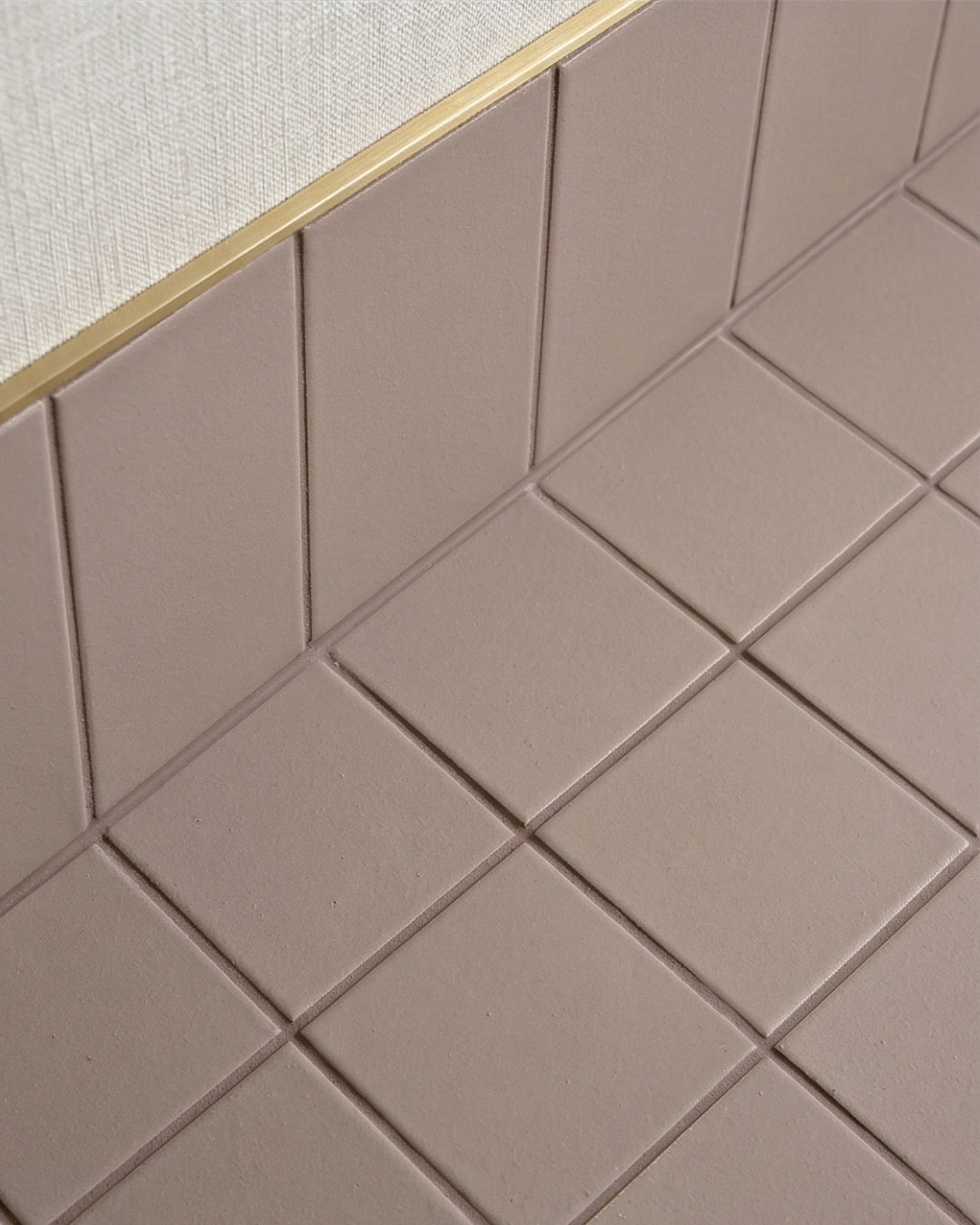 Boot Brown clay tiles by Clay Imports with a matte finish, laid in diagonal and vertical patterns.
