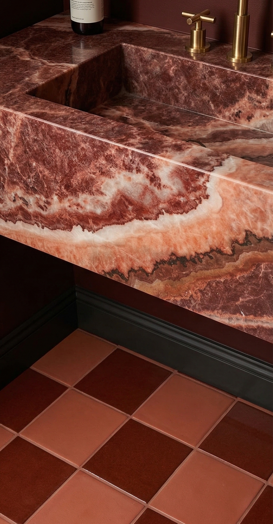 Solid tile by Clay Imports in a two-tone checkered pattern, featuring alternating terracotta and deep reddish-brown hues on the floor.